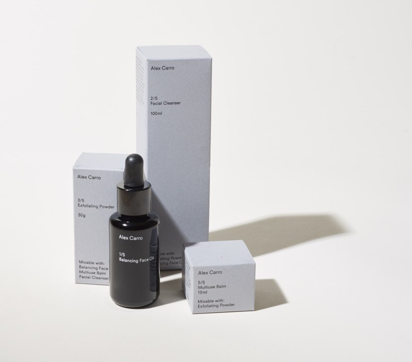 Alex Carro skincare products including facial cleanser, exfoliating powder, balancing face oil and multiuse balm with minimalist packaging.