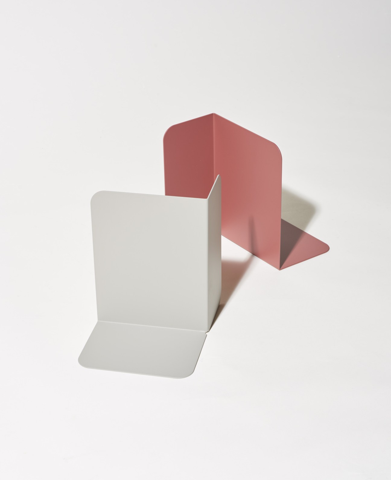 Muuto Compile bookends in brass and stainless steel by Cecilie Manz.