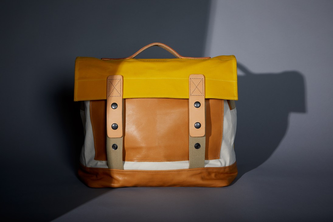 Colorful canvas and leather work bags with waxed finish and tan handles