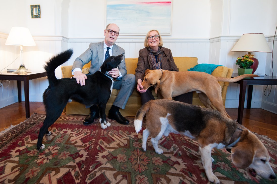 Jari Sinkari, Finland's consul-general to Hong Kong and Macau, sits with his wife Caroline and their cocker-King Charles spaniel cross Charlie in their residence.