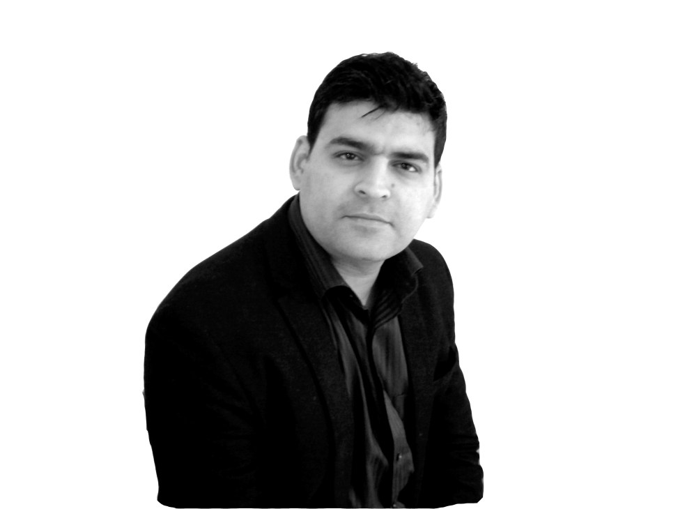 Black and white portrait photograph of Dr Vishal Talwar.