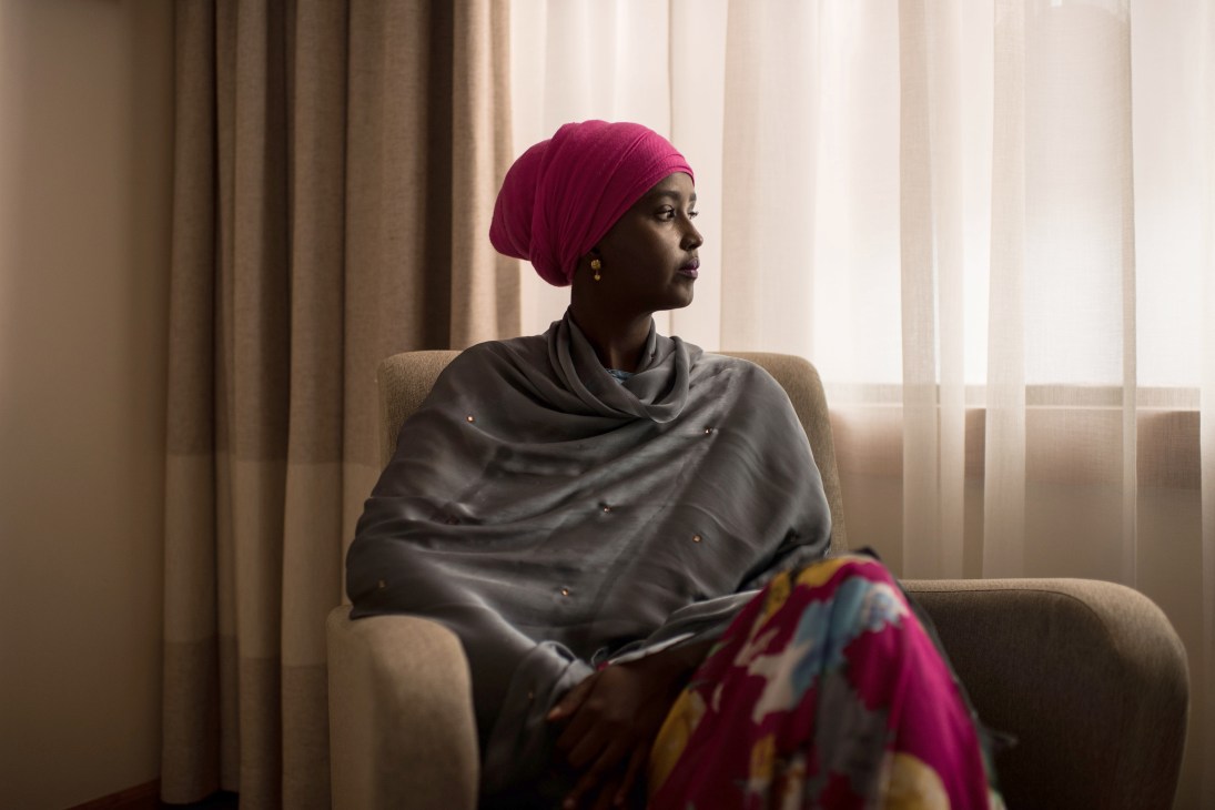 Fadumo Dayib, Somali presidential candidate, seated wearing a burgundy head wrap and black shawl.