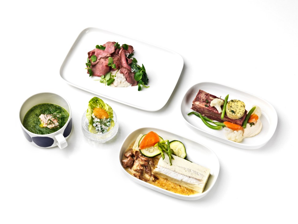 Fine dining plated dishes including sliced beef, soup, and fish with vegetables arranged on white plates.