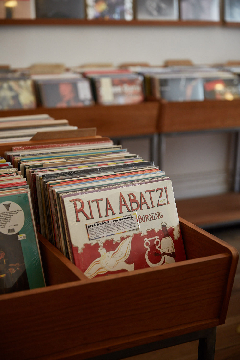 Vinyl records displayed in wooden bins at Stranded record shop in San Francisco