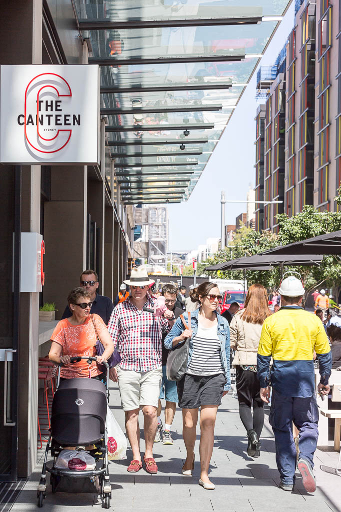 The Canteen storefront at Barangaroo with pedestrians walking past on a sunny street.