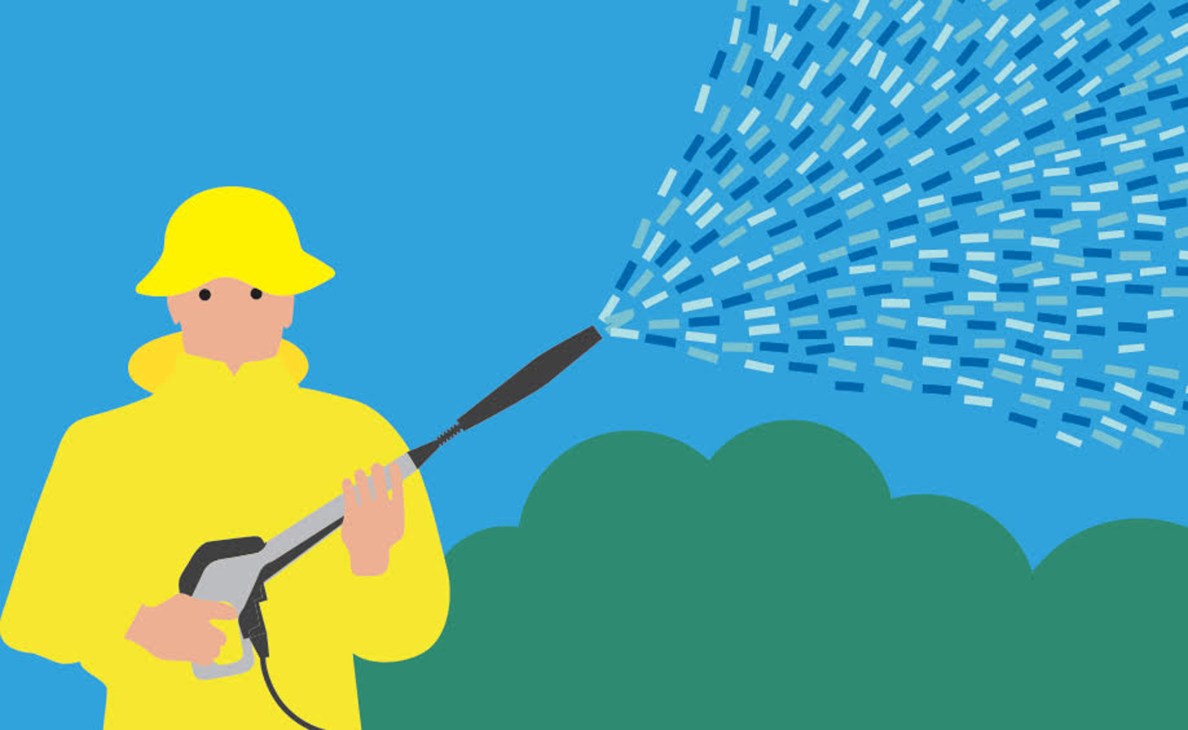 Illustration of a person in yellow raincoat and hat using a pressure washer to spray water.