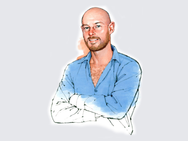 Portrait of John Martin, head of conservation, wearing a light blue shirt with arms crossed.