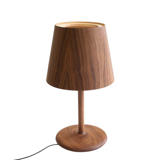 Hand-finished walnut table lamp with conical shade and circular base by Pierre + Charlotte.