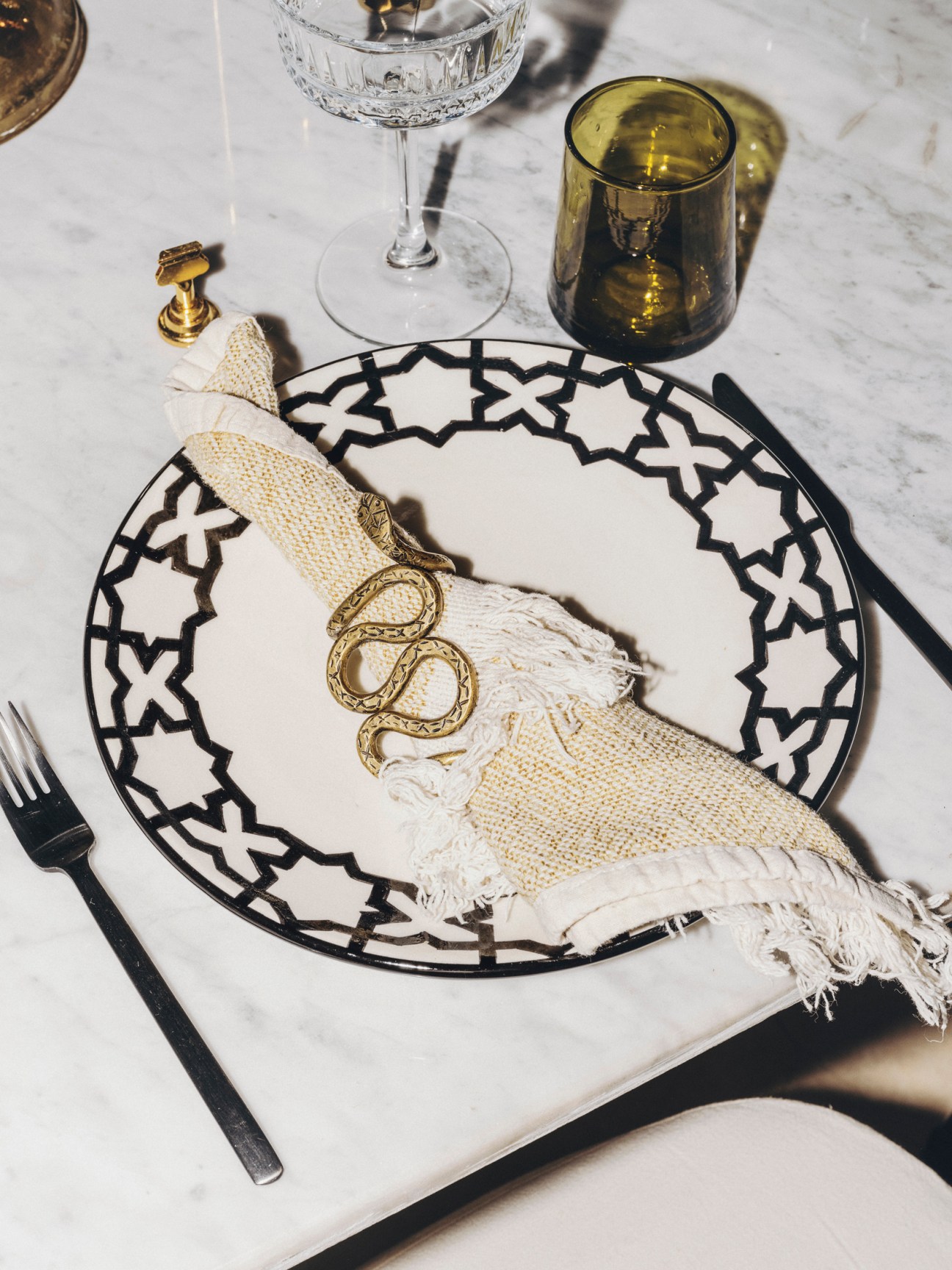 The table setting ultimately triumphed over the ginger cat