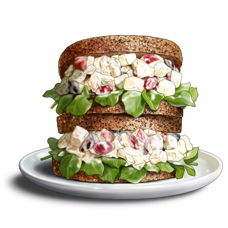 Chicken Waldorf sandwich on seeded bread with lettuce, showing creamy filling with chicken, apple, celery and walnuts