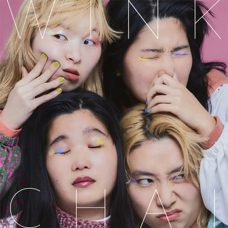 Four young people with colorful eyeshadow and nail art against a pink background for Chai's album Wink.