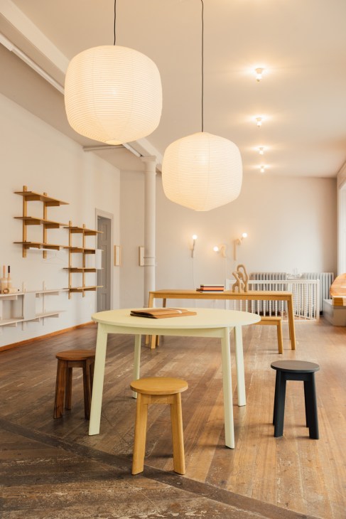 Studio Atebo workshop showing wooden furniture and accessories in production