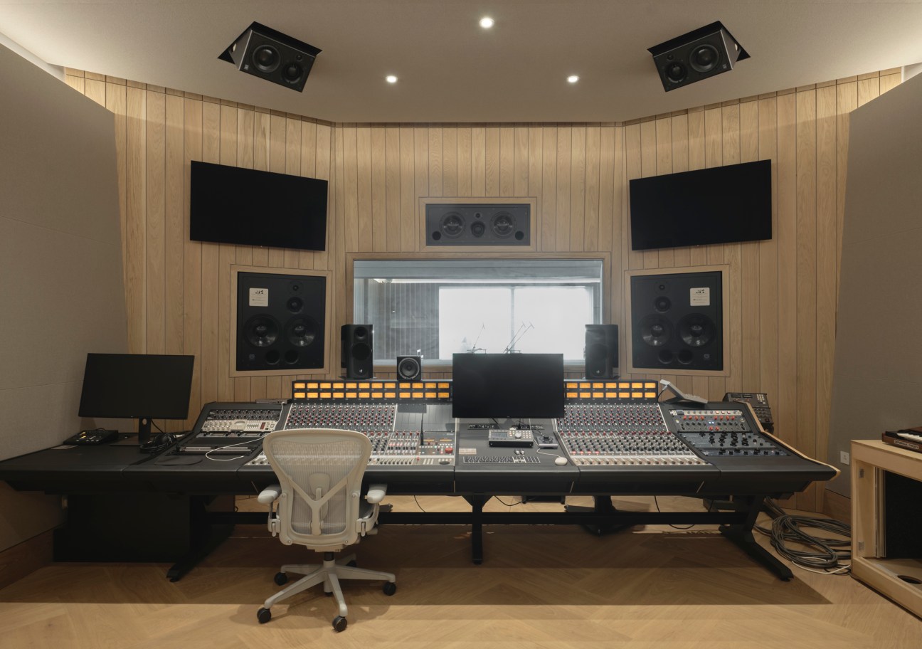 Professional mixing console with multiple channels and controls in Studio Richter Mahr recording facility