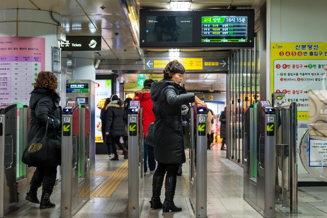 Seoul public transportation scene showing subway, bus or bike-share system