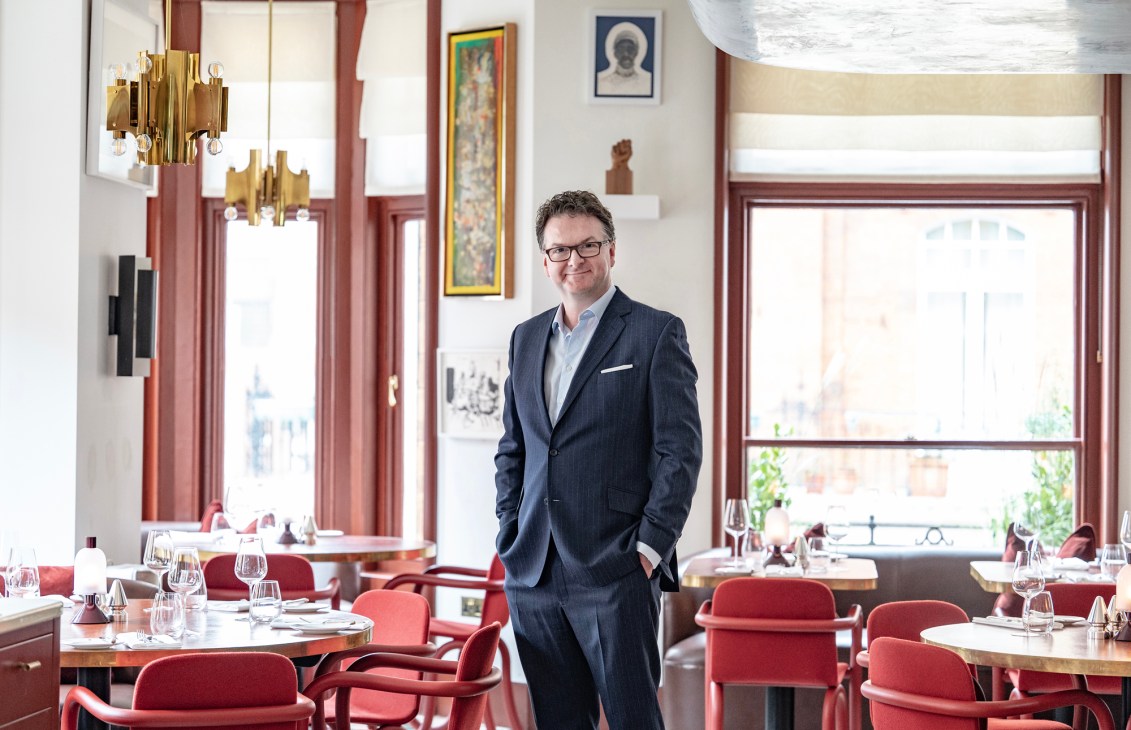 Ewan Venters sitting at a restaurant table in Mount Street restaurant