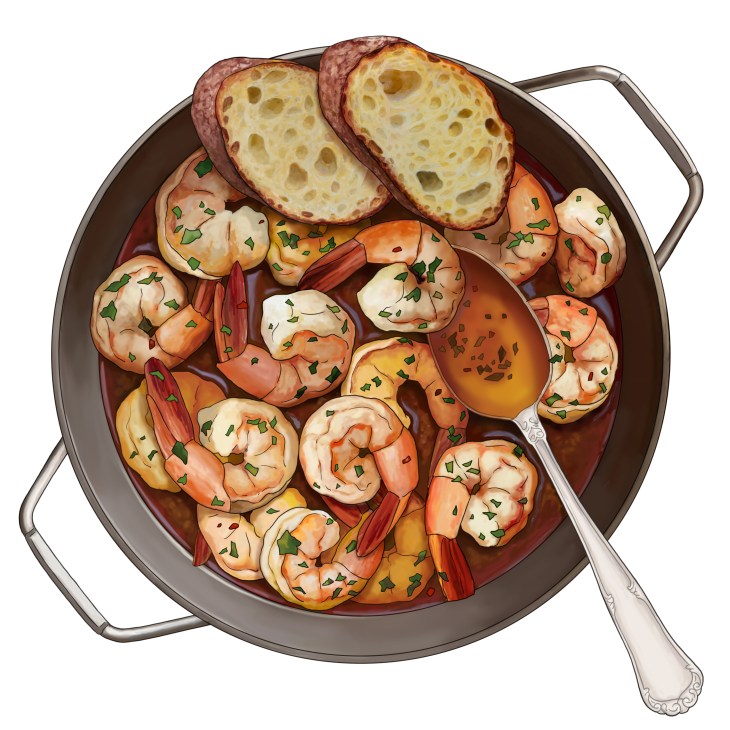 Prawns cooked with garlic and herbs in a dark pan with a serving spoon
