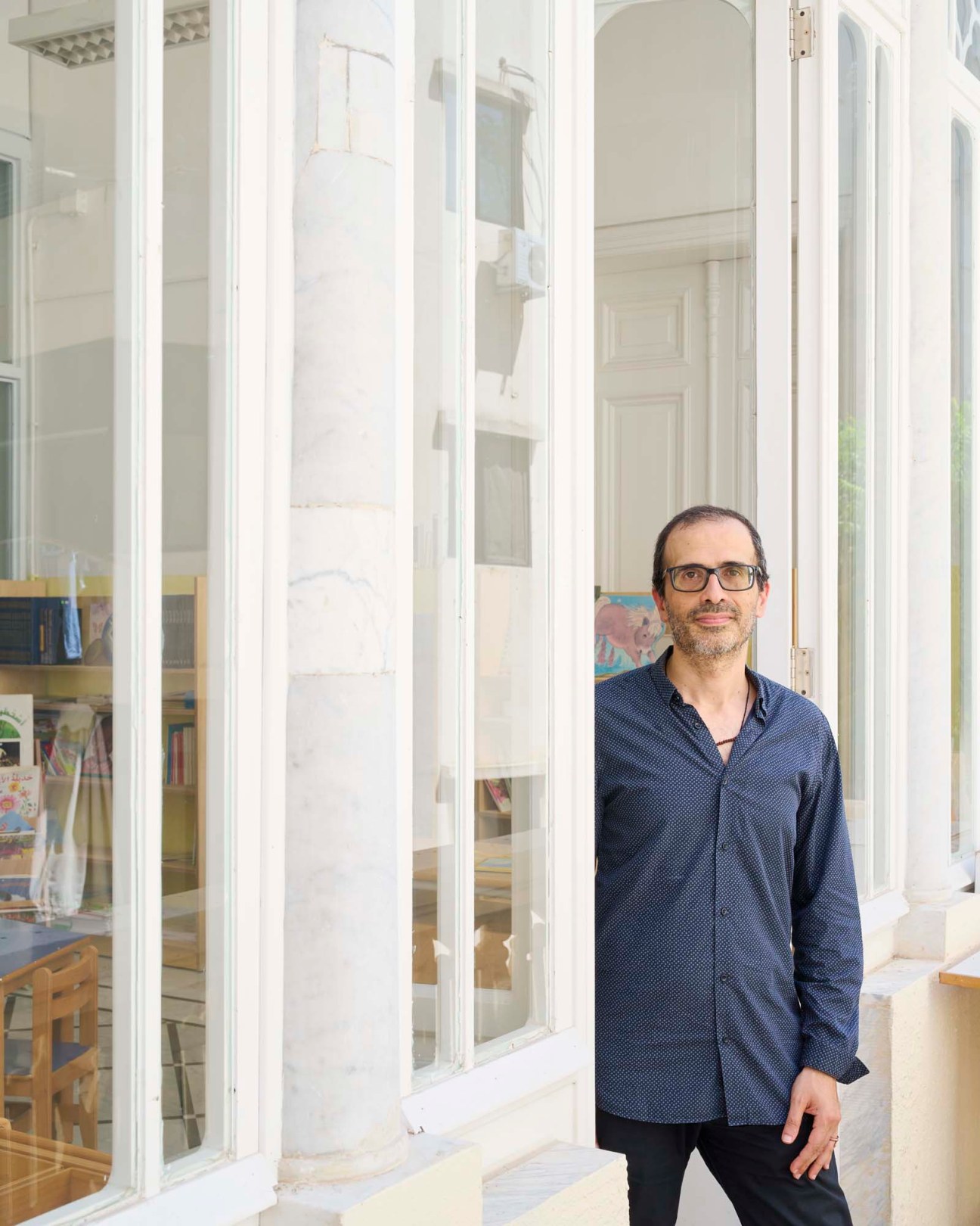 Portrait of architect Karim Nader standing outdoors in Beirut