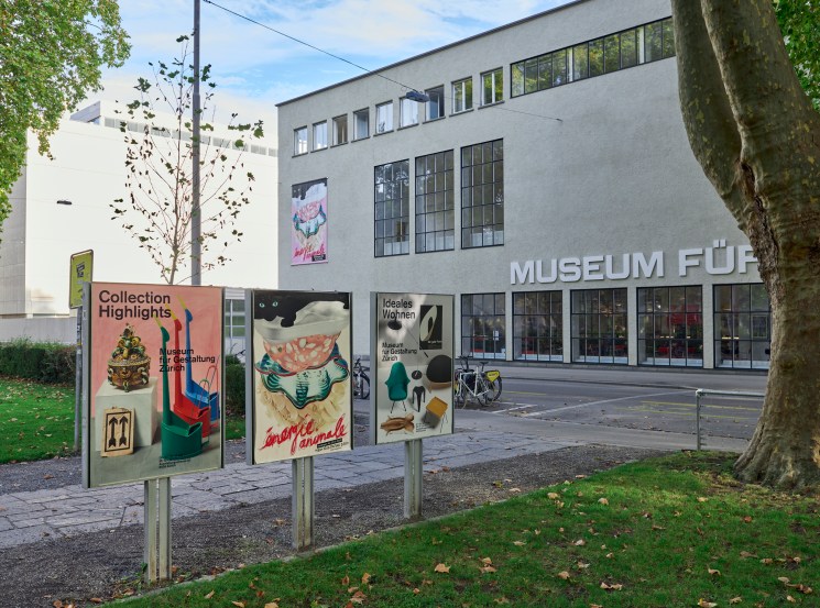 Museum für Gestaltung building exterior with poster displays showing exhibition advertisements