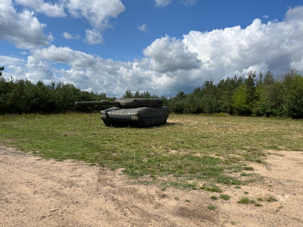Inflatable Leopard 2A4 tank decoy positioned in field