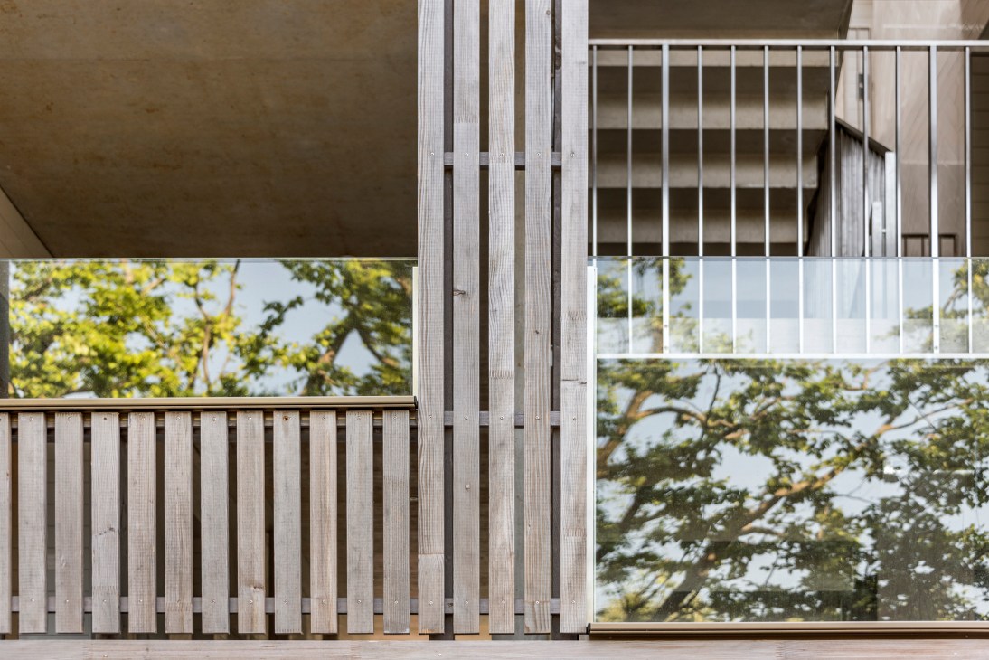 Communal courtyard spaces at 55 Rigaud with resident-tended plants and shared facilities