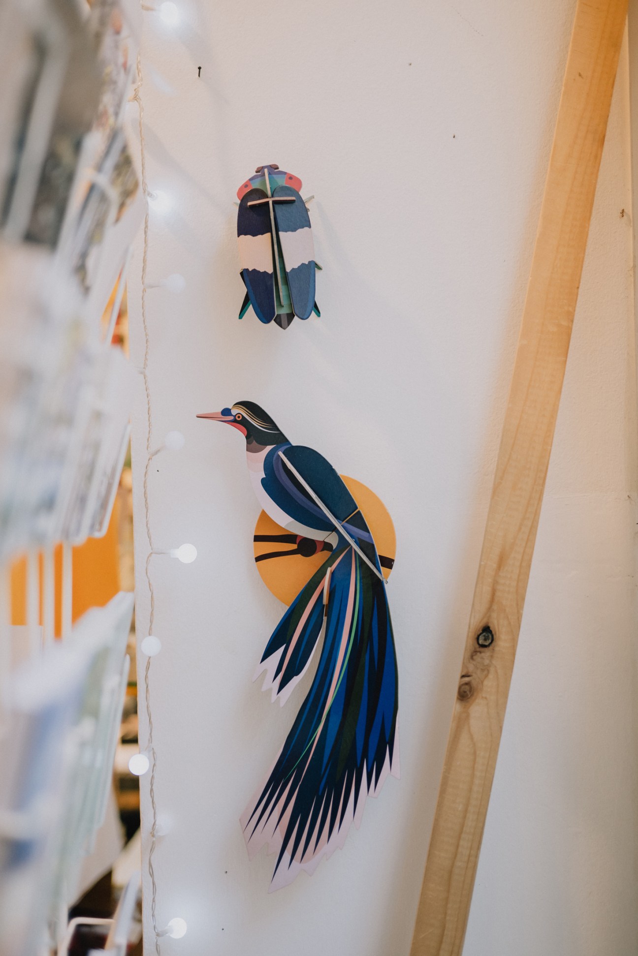 Close-up of handbound notebooks and custom wrapping paper at Lúd Labor