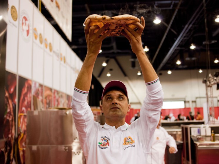 Marco di Amoriello shows the airy dough of Neapolitan pizza