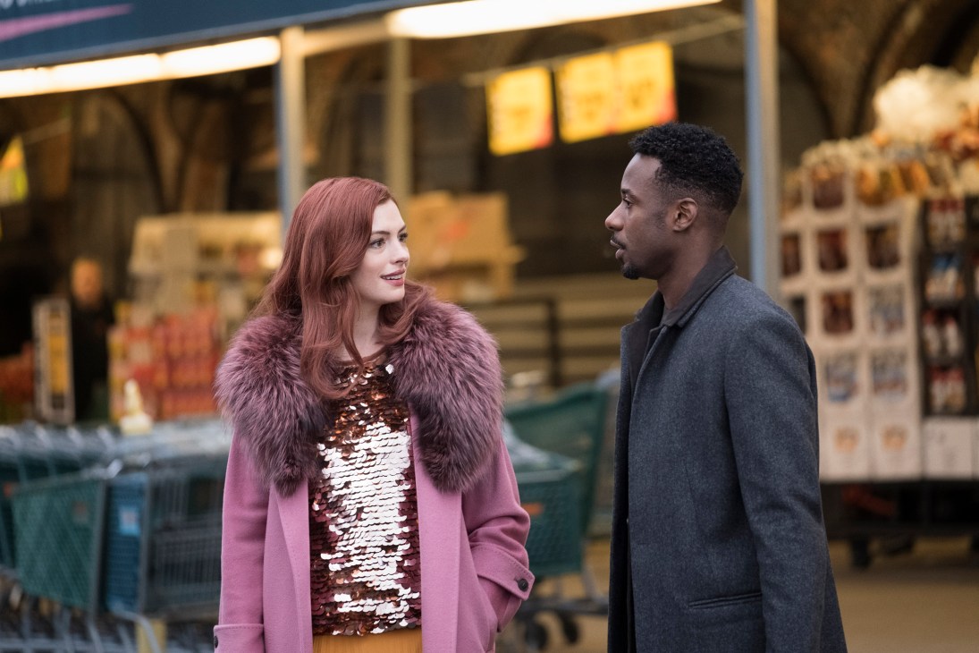 A woman and man converse outside a storefront in a scene from the Amazon Prime series Modern Love.