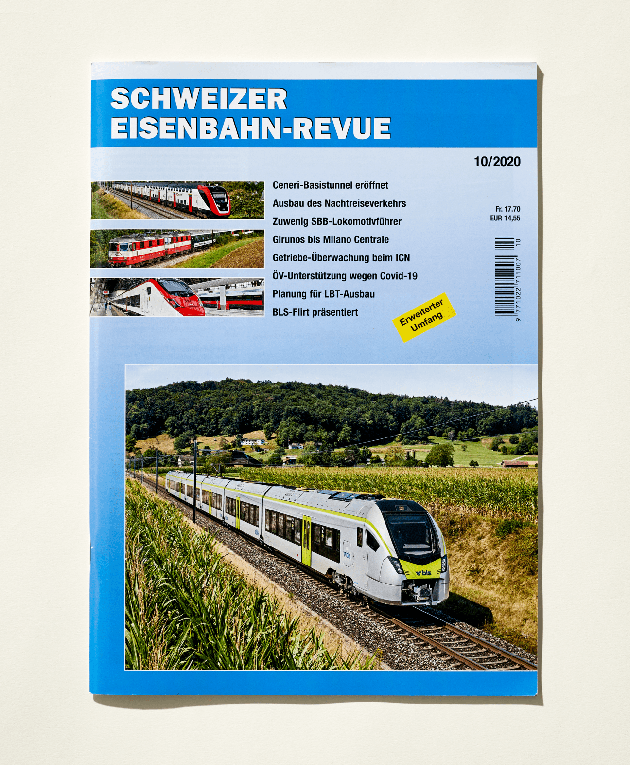 Cover of Schweizer Eisenbahn-Revue magazine issue 10/2020 featuring a white and yellow train traveling through Swiss countryside.