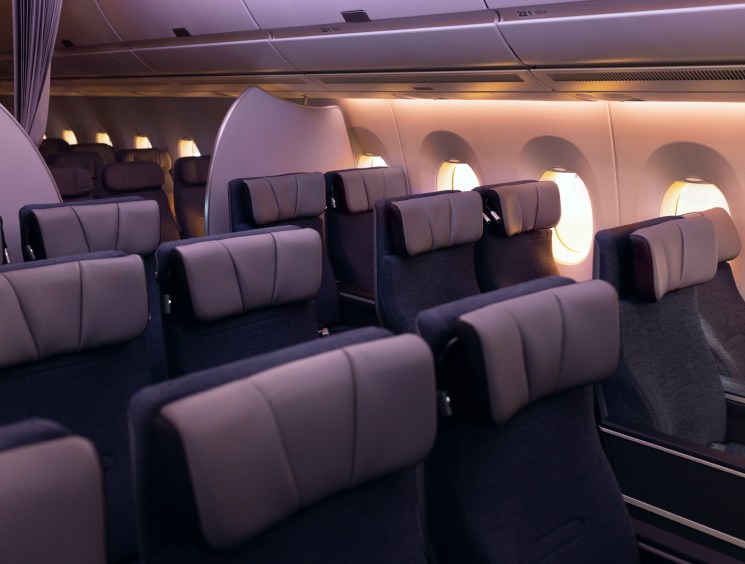 Premium economy class seating in Finnair's refurbished aircraft showing enhanced comfort features