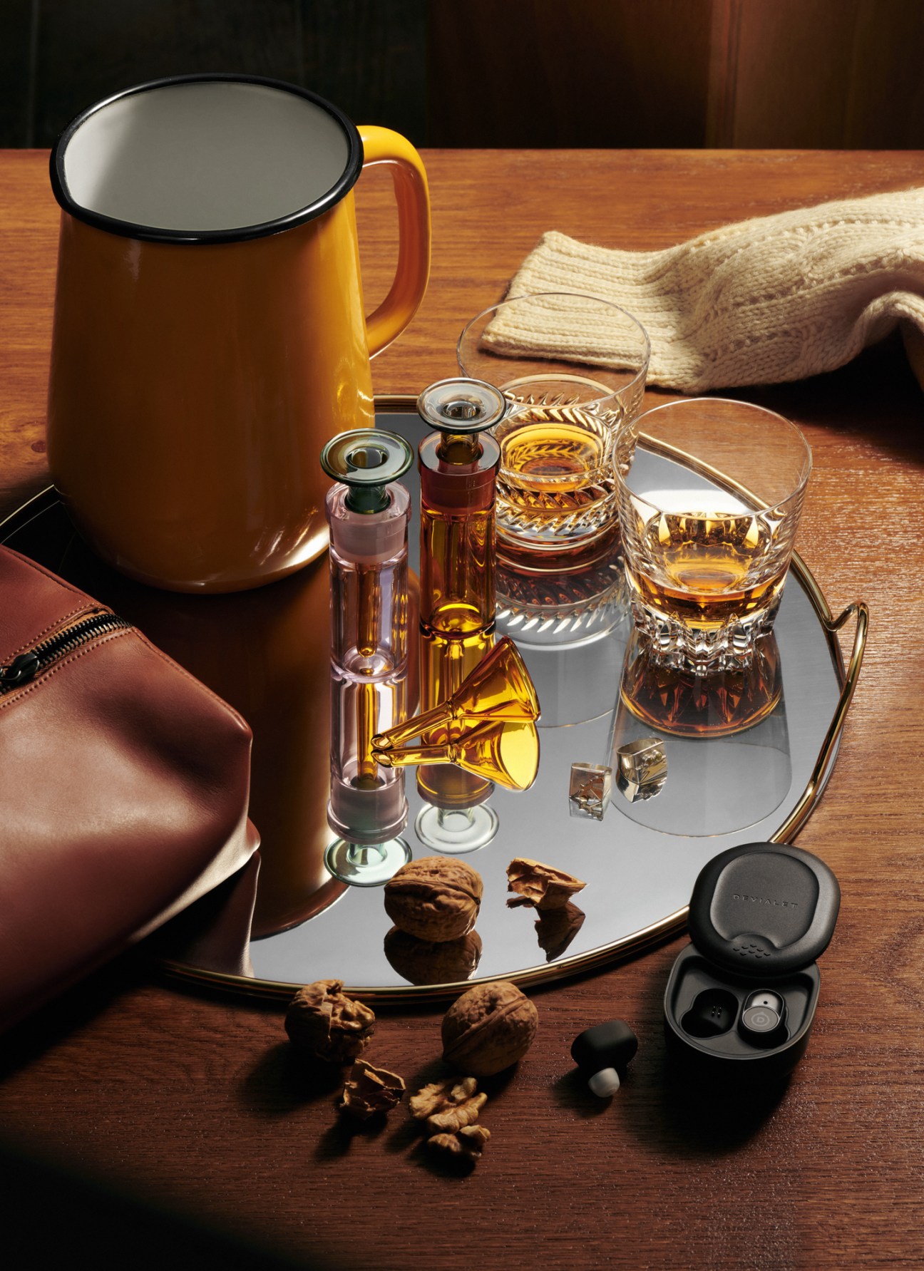 Personal accessories including enamel jug, glasses, pullover, washbag, tray, perfumes, rings and earbuds