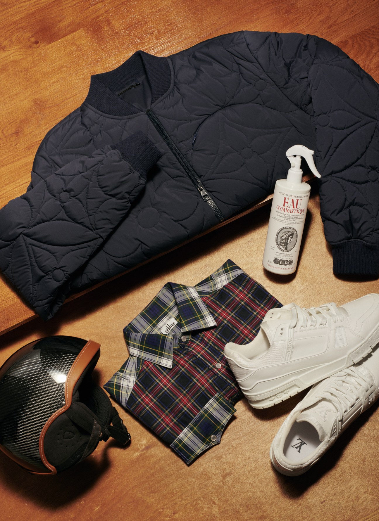 Athletic wear and accessories including jacket, shirt, helmet, spray bottle and trainers