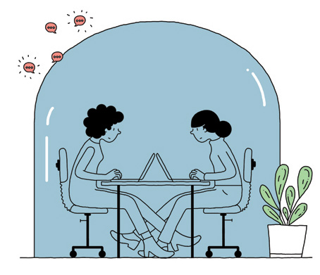 People working in bright, modern co-working space with large windows