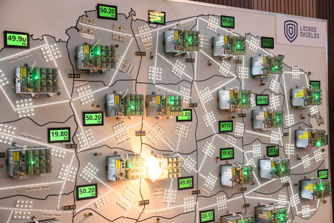 Electrical power grid substation with high voltage equipment and transmission lines