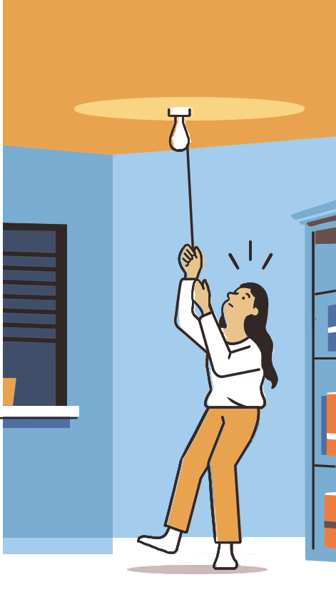 Person pulling on a rope to turn off a ceiling light fixture in a blue room
