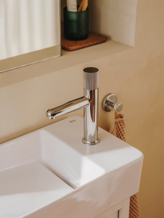 Roca Nu tap with striped handle showing the minimalist design