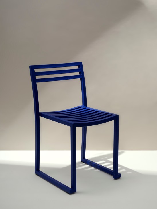 Chop outdoor furniture collection by Philippe Malouin showing stackable chairs and tables in various finishes
