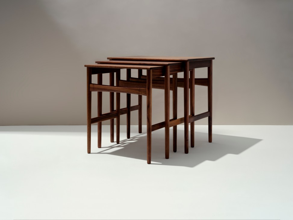 Set of three wooden nesting tables with minimalist design and natural wood finish
