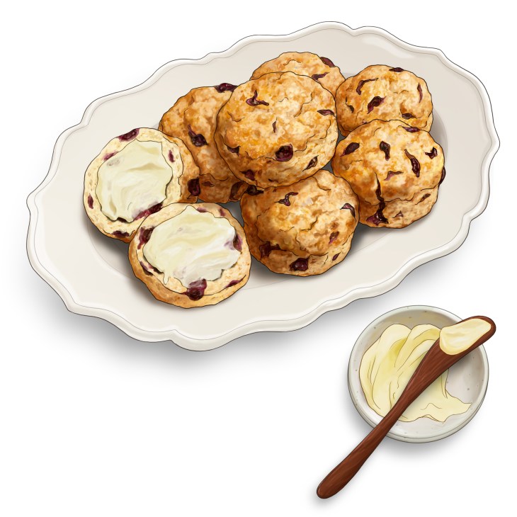 Fresh baked scones with cranberries on a decorative plate with butter and knife