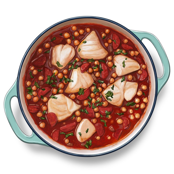 Cod, chorizo and chickpea stew in a mint green Dutch oven with visible fish chunks, chorizo, chickpeas and herbs