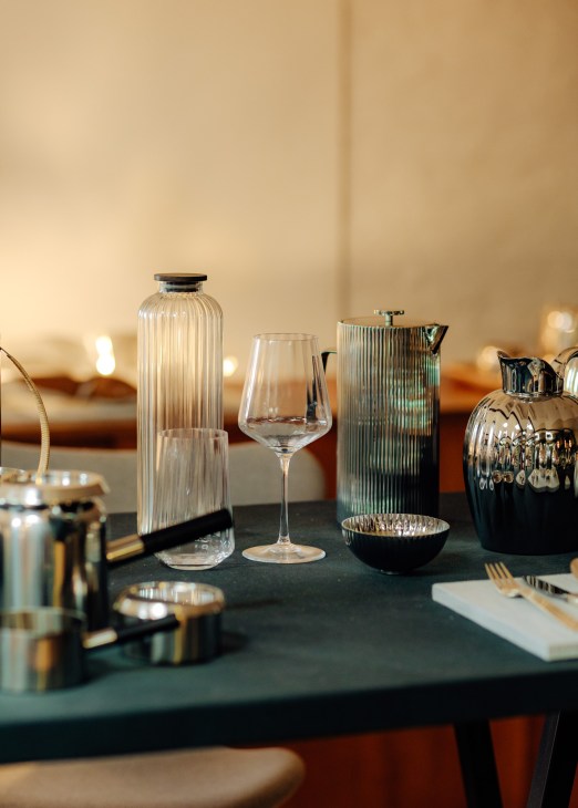 Elegant table setting with Georg Jensen silver pieces including bowls, serving dishes and decorative items