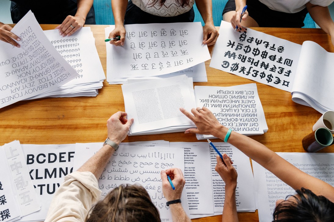 Display of Sharp Type's Sharp Earth typeface showing various letterforms and characters