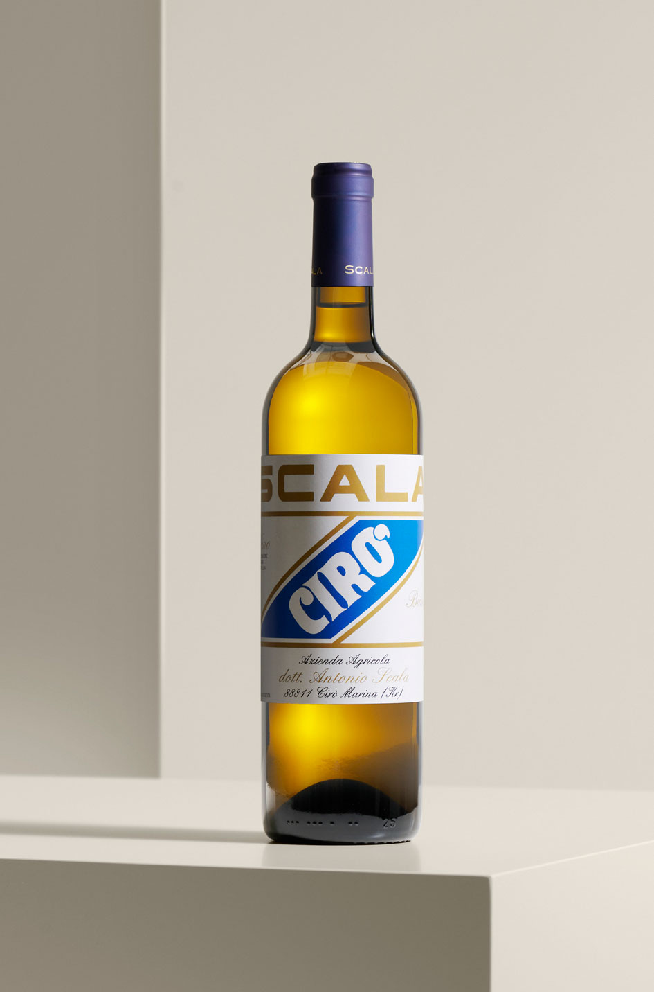 Scala Cirò Bianco wine bottle with vintage blue and gold label design