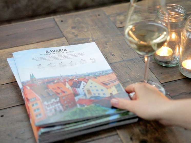 A magazine survey about Bavaria on a table.
