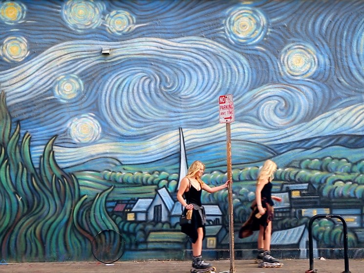 Two women skating in Los Angeles.