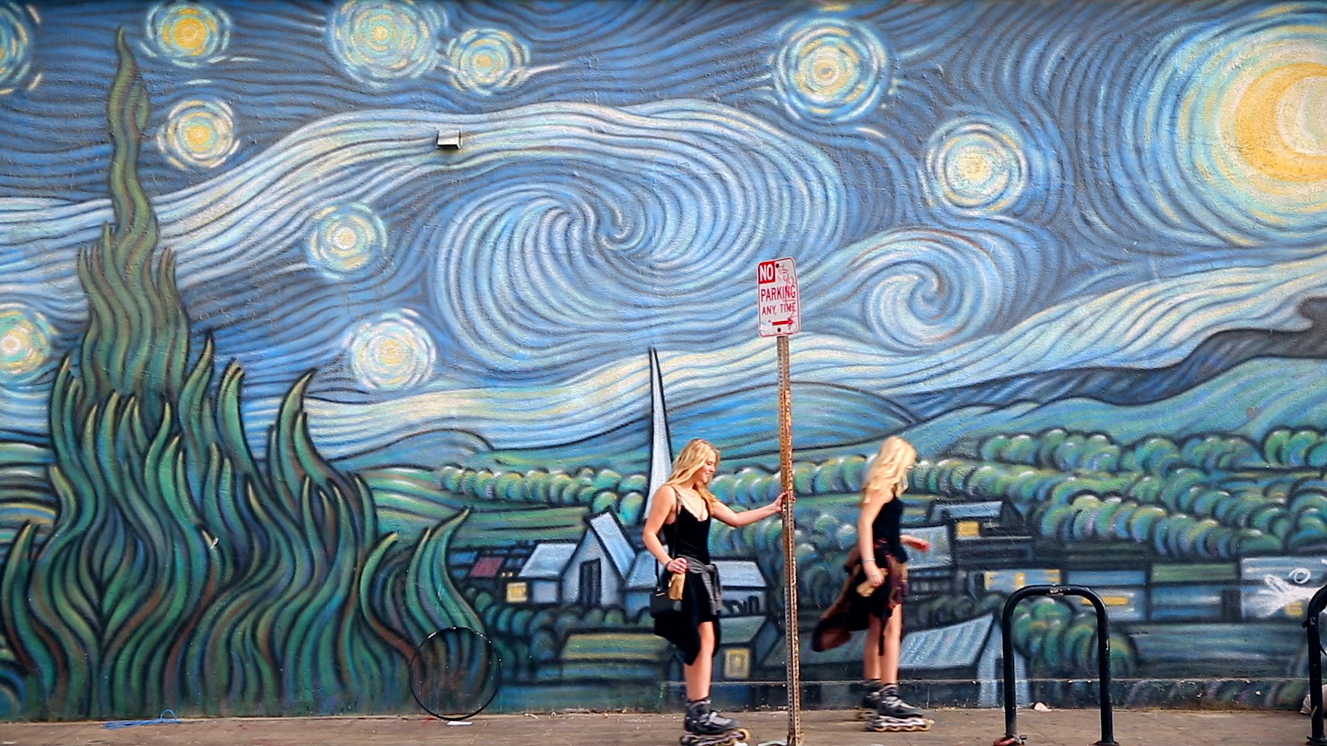 Two women skating in Los Angeles.