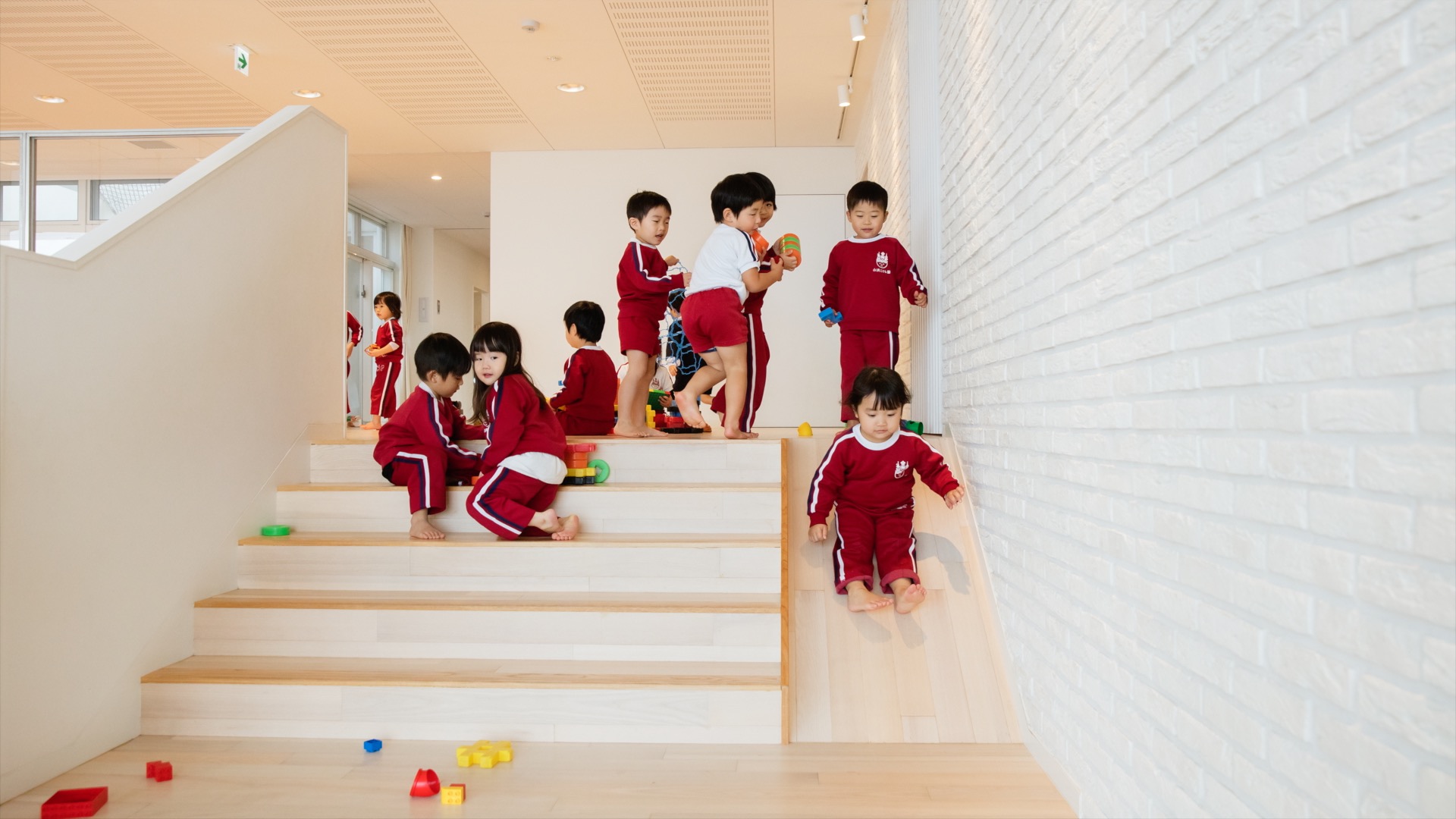Children playing at a kindergarten in Japan.