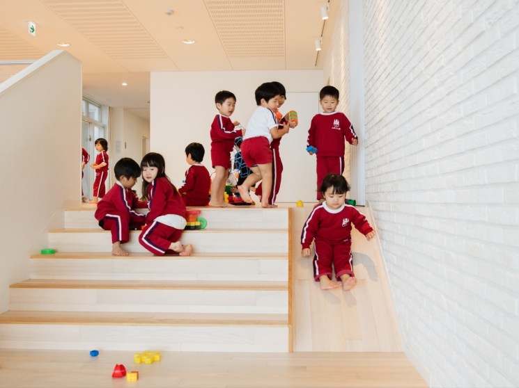 Children playing at a kindergarten in Japan.