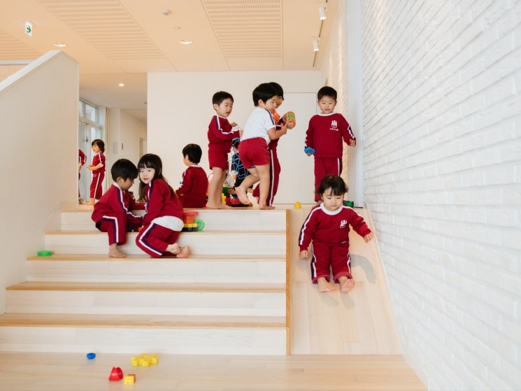 Children playing at a kindergarten in Japan.