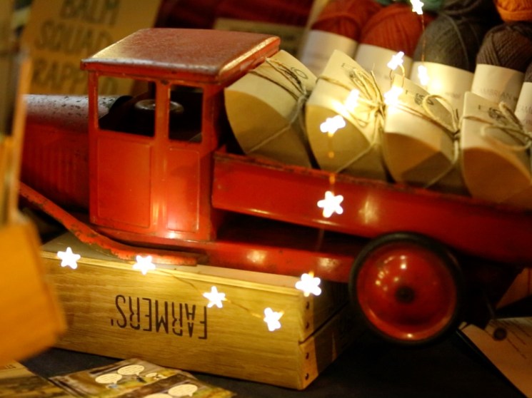 A wooden toy truck