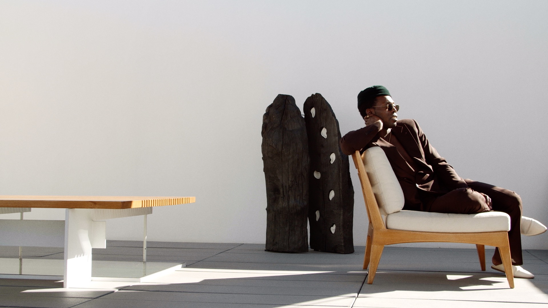 A man sitting on a terrace.
